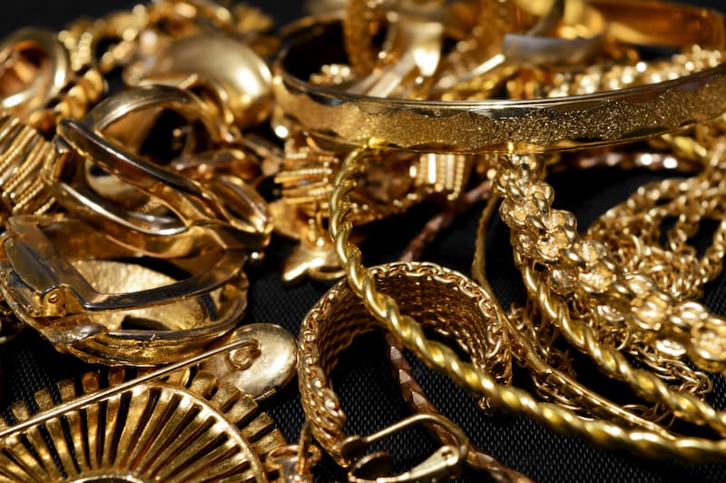 Golden Jewelry in a black background
