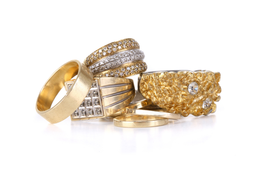 A pile of Golden Jewelry some of which with diamonds